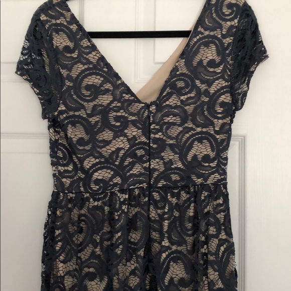 Navy blue lace dress with nude underlay - Picture 4 of 5